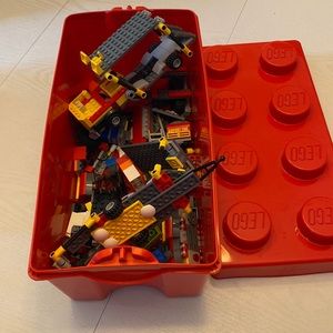 Miscellaneous Lego sets in a nice red Lego Container.